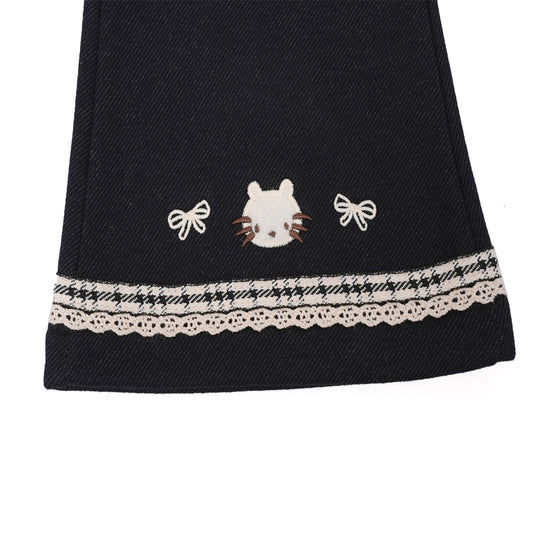 Navy stretch pants with lace & cat embroidery at hem