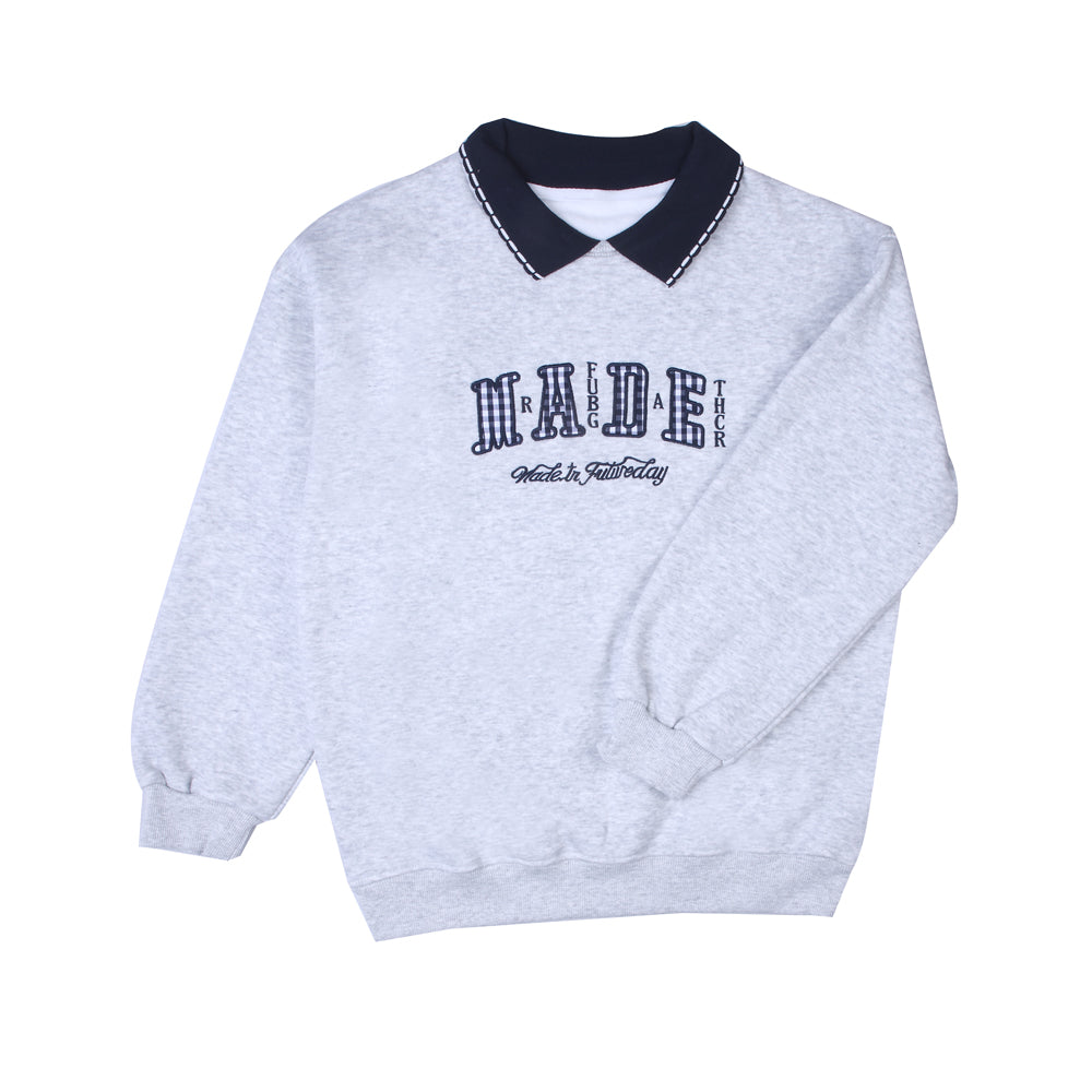Grey collared T-shirt with navy accents