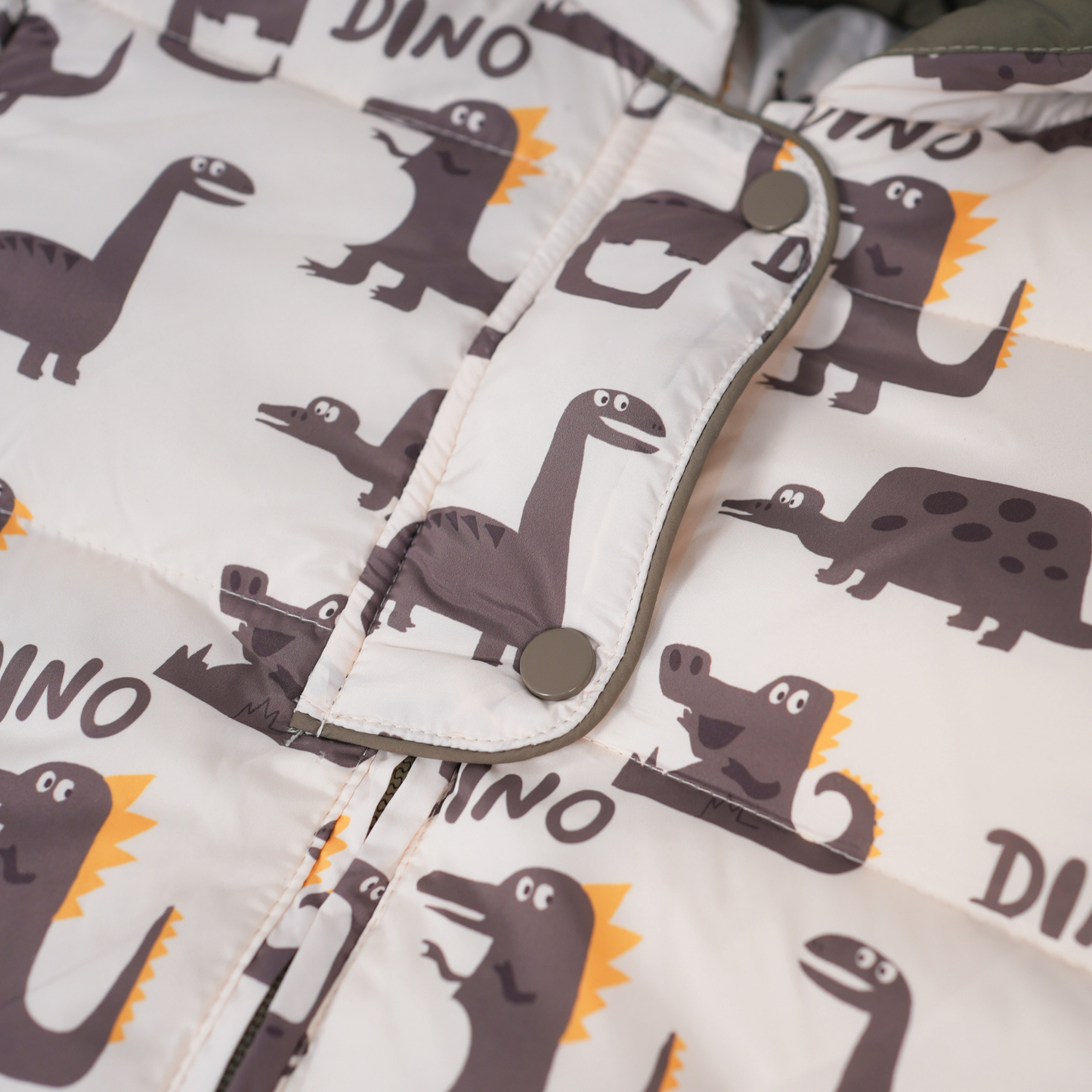 Dinosaur print puffer with 3D LIGHT ears
