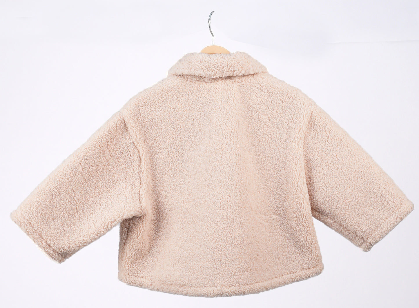 Beige fleece pullover with teddy accessory