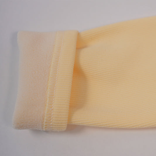 Butter yellow tee with embroidered collar motif