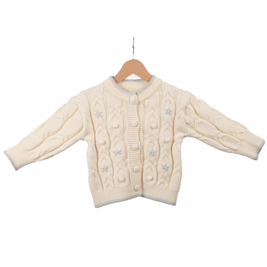 Cream sweater with blue flower accents