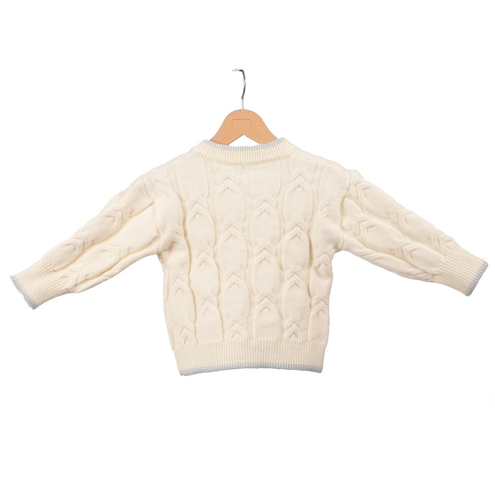 Cream sweater with blue flower accents