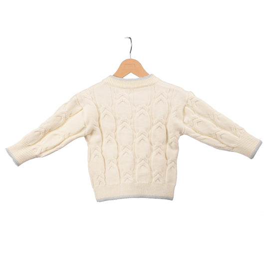 Cream sweater with blue flower accents