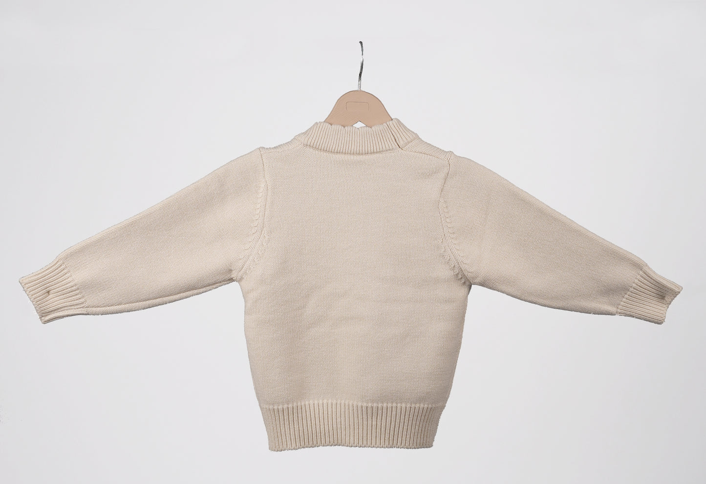 White pom pom sweater