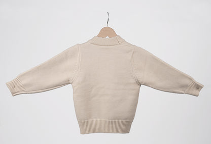 White pom pom sweater