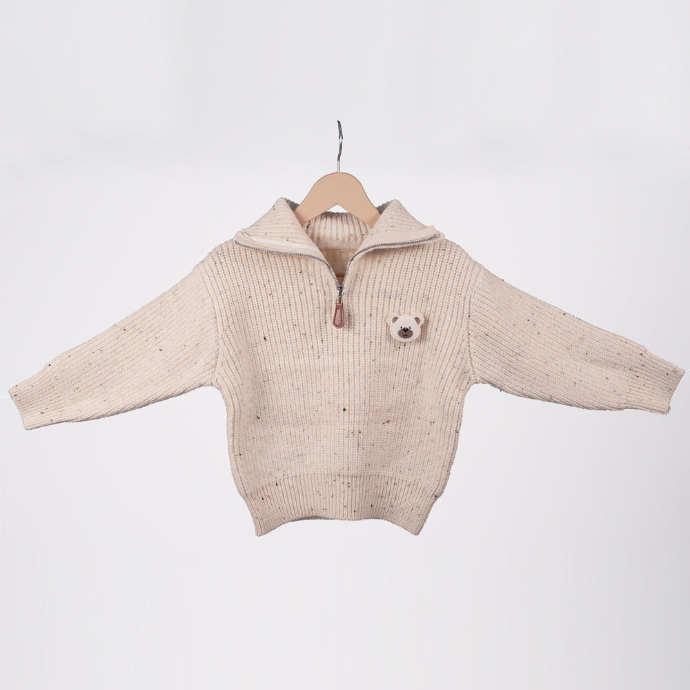 Cream zip-up knit sweater with bear brooche