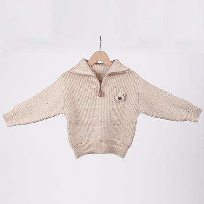Cream zip-up knit sweater with bear brooche