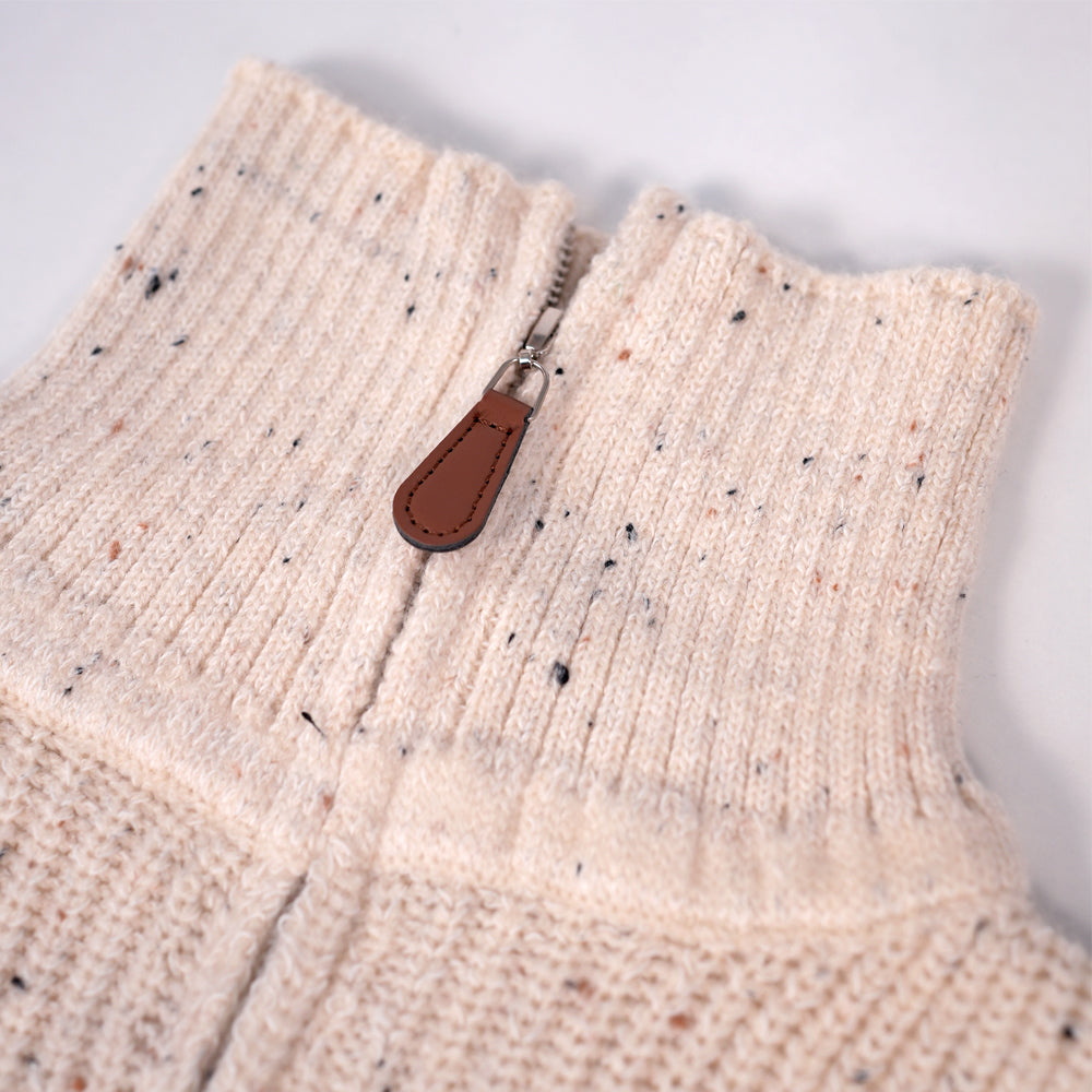 Cream zip-up knit sweater with bear brooche