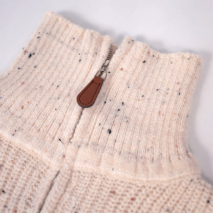 Cream zip-up knit sweater with bear brooche