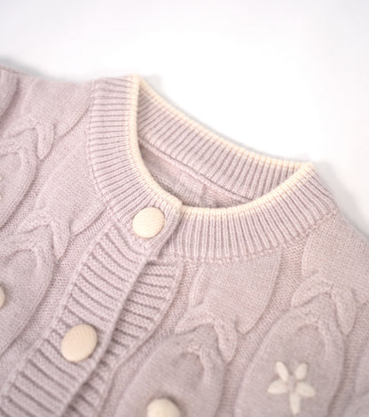 Dusty lilac sweater with white flower accents