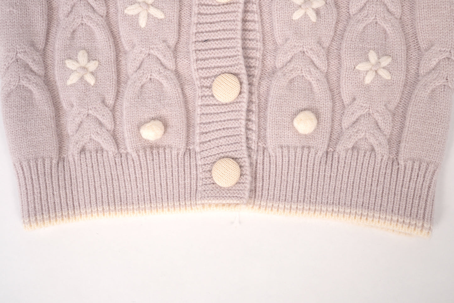 Dusty lilac sweater with white flower accents
