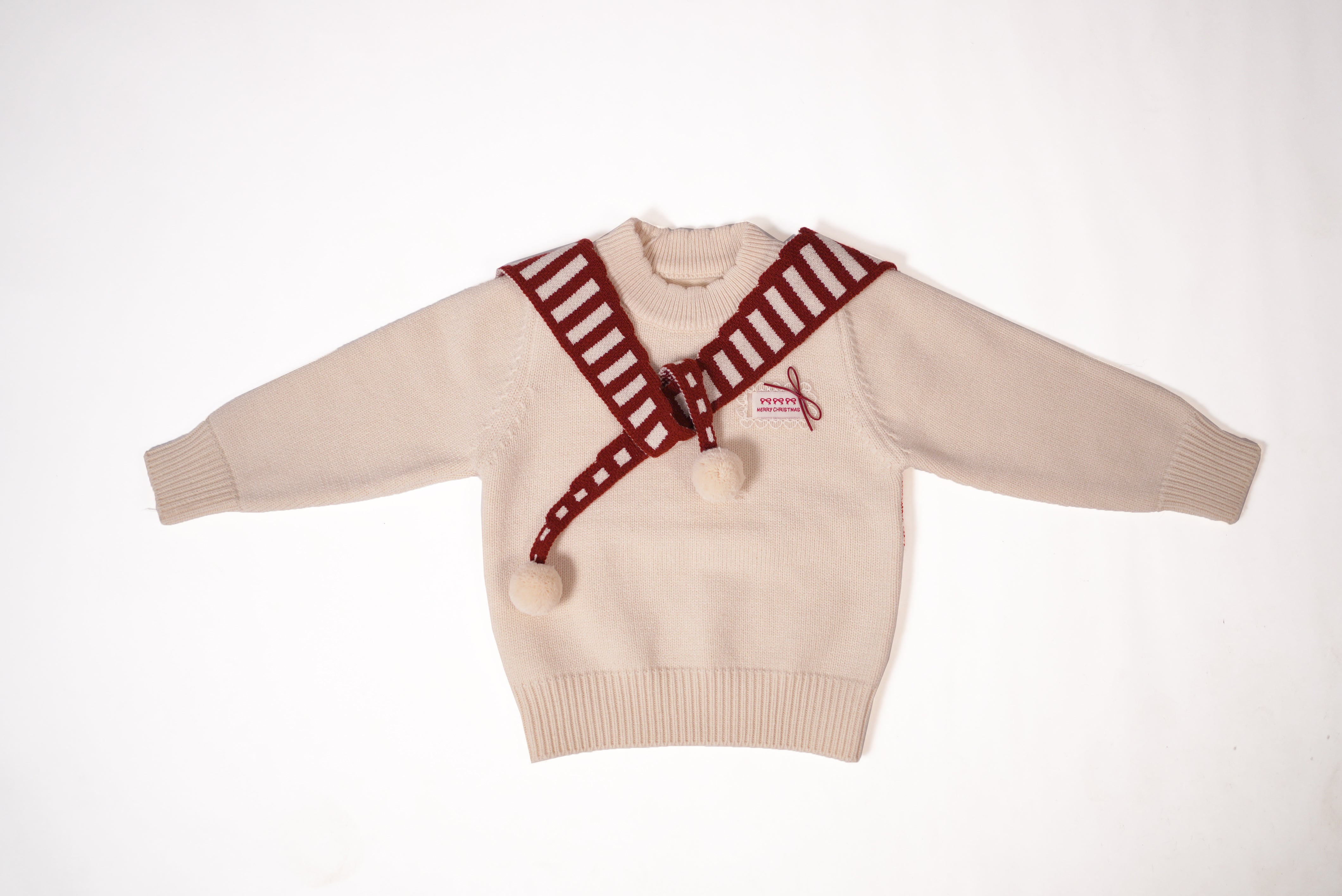 White pom pom sweater